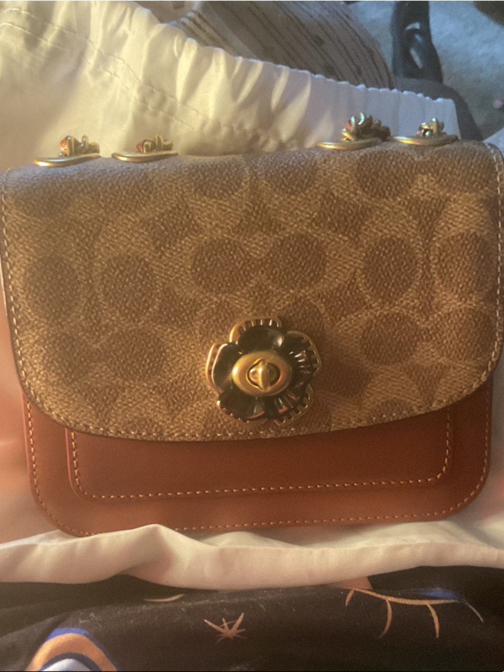 Coach Signature Floral Turnlock Crossbody in Brown and Tan